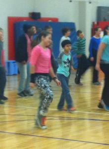 Ana is actually dancing with her fifth grade class!